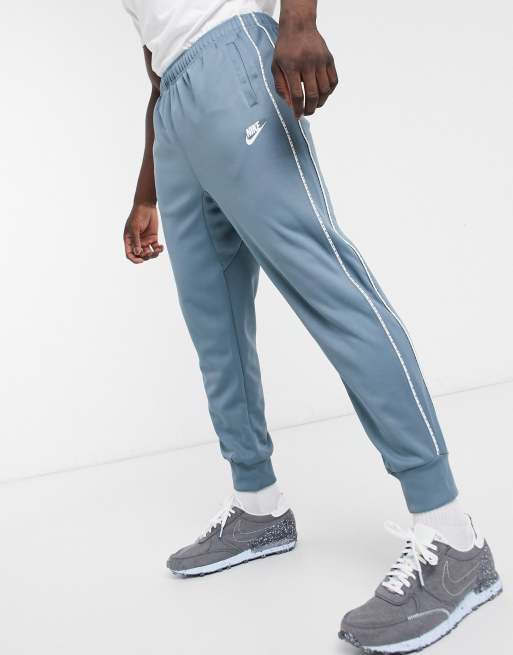 Nike repeat pack logo 2025 taping cuffed joggers in grey