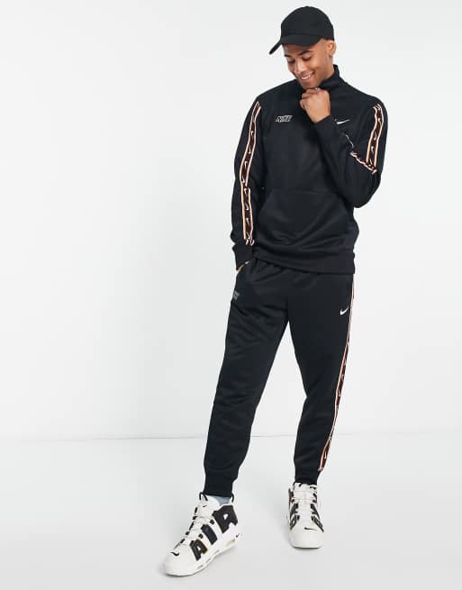 Nike black clearance half zip tracksuit