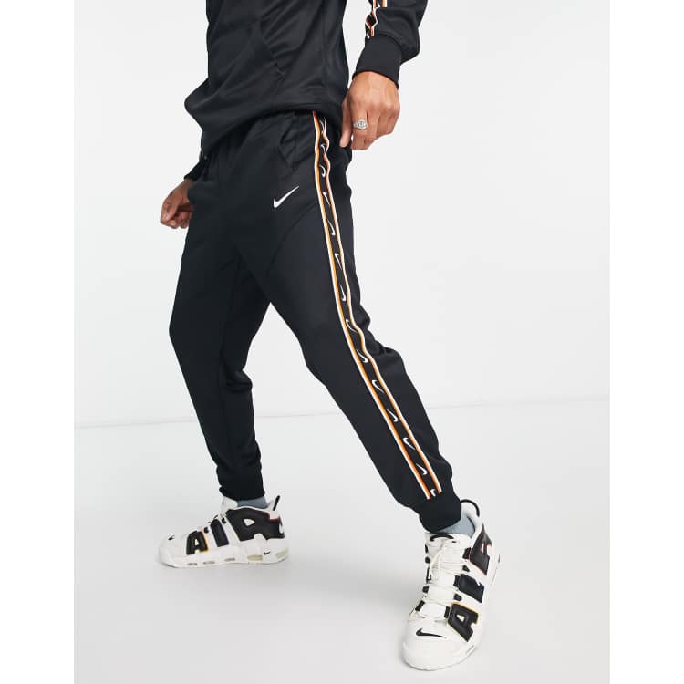 Nike repeat pack poly knit joggers in black and gold