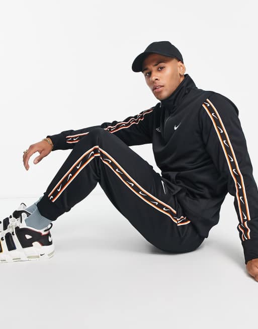 Nike repeat pack poly knit joggers in black and gold