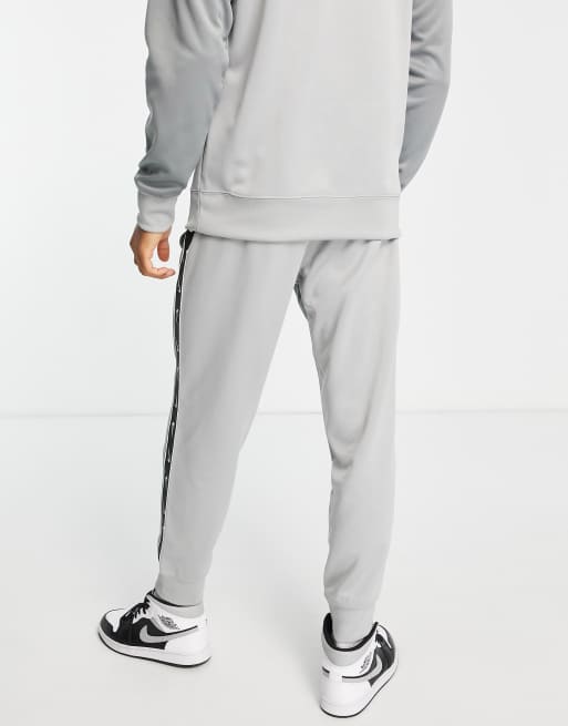 Nike repeat pack poly knit joggers in grey