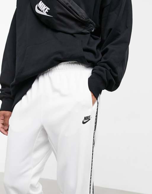 Nike Repeat Pack polyknit logo taping cuffed joggers in white ASOS