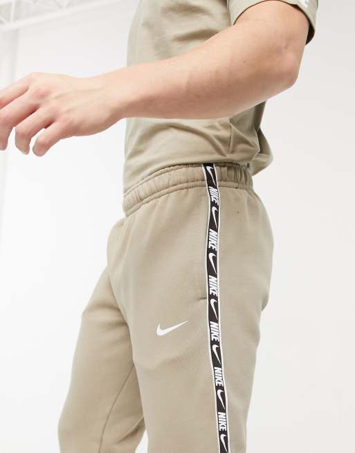 Pantalon best sale nike beige