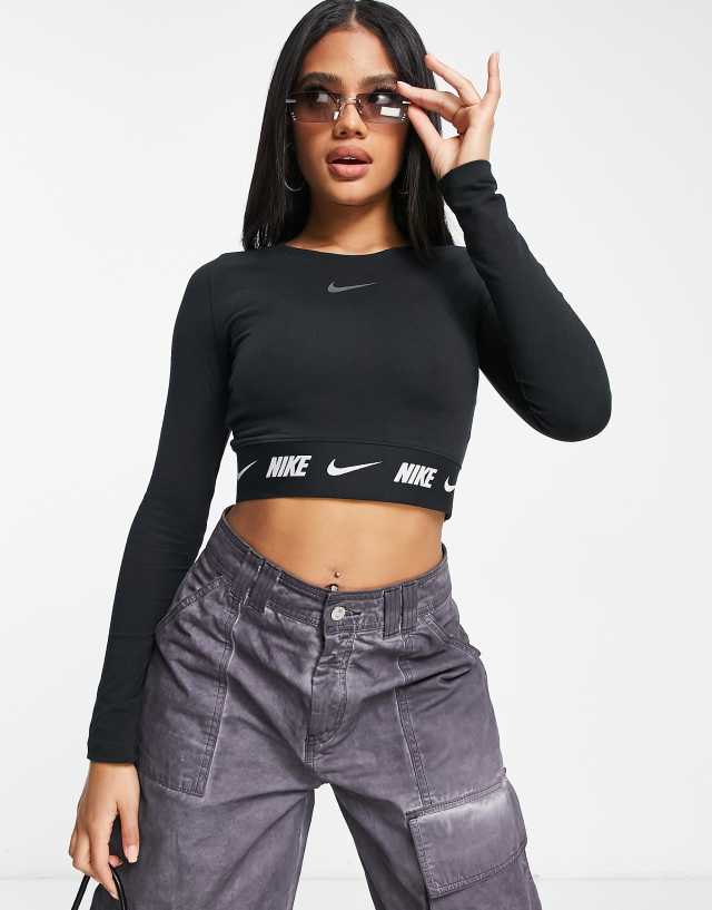 Nike Repeat Tape detail long sleeve crop top in black