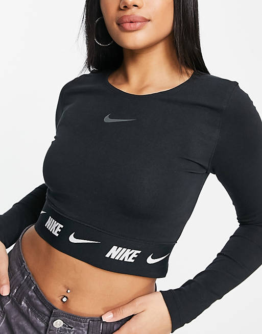 Nike Repeat Tape detail long sleeve crop top in black