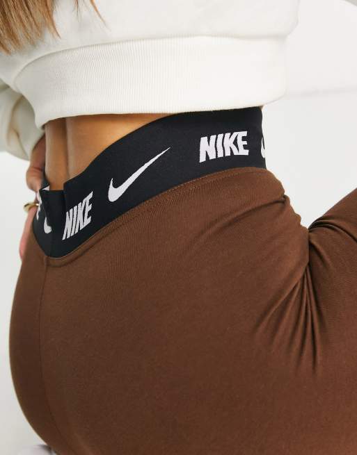 Nike Repeat Tape high rise leggings in brown ASOS