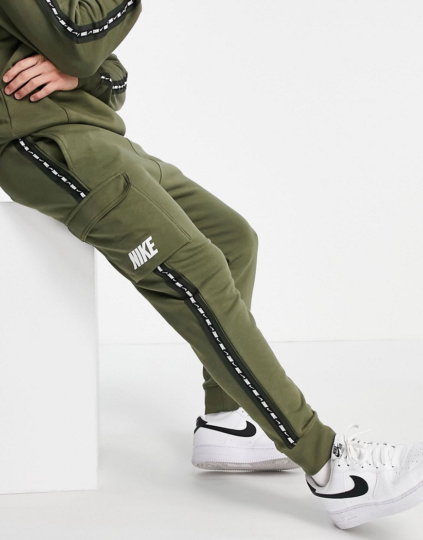 Nike Repeat taping fleece cargo joggers in khaki-Green