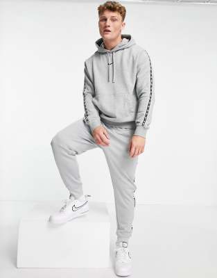 nike repeat tracksuit grey