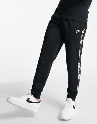 Nike Repeat taping polyknit jogger in 