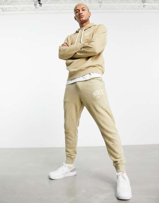 Nike - Retro Arch - Losvallende joggingbroek in beige