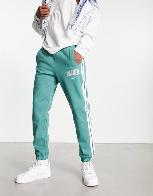 Nike Retro fleece joggers in green