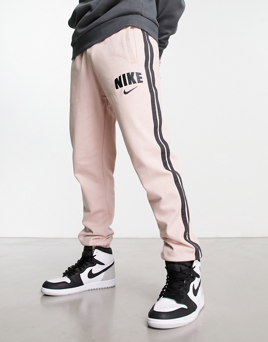 Nike Retro fleece joggers in pink oxford