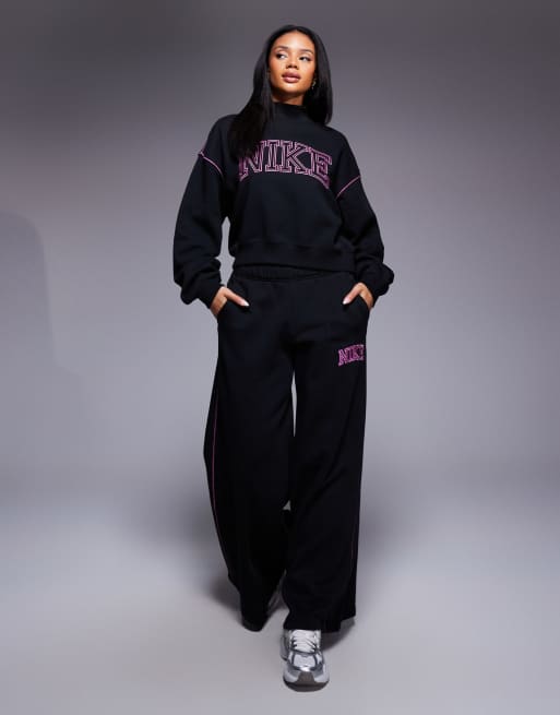 Nike retro logo mock neck sweatshirt in black and pink