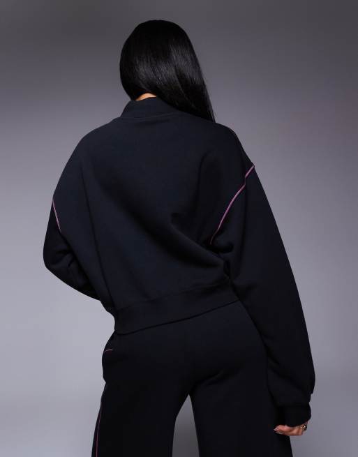 Nike retro logo mock neck sweatshirt in black and pink