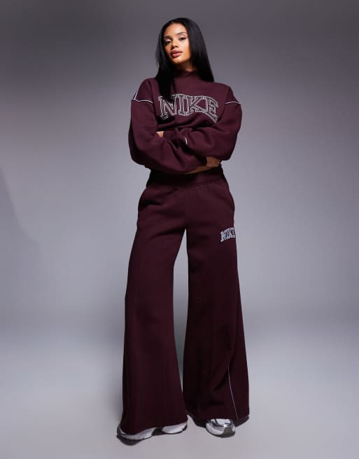 Nike retro logo straight leg joggers in burgundy