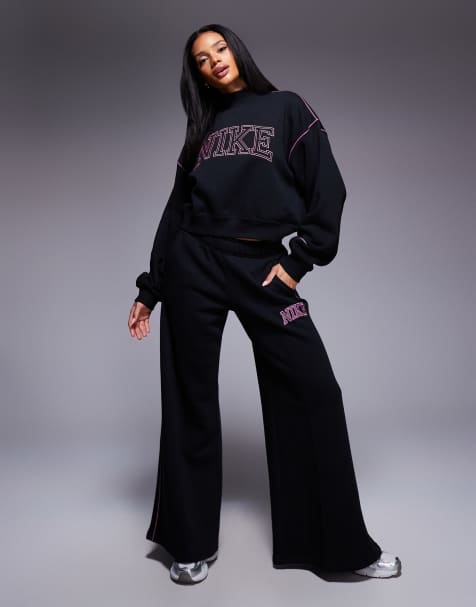 Nike retro logo straight leg sweatpants in black - view 1