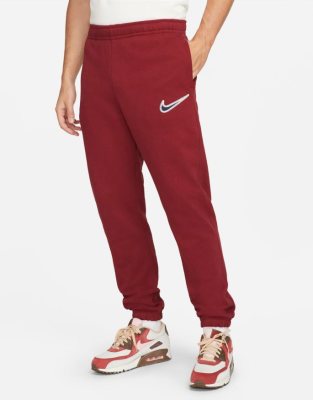 nike red swoosh joggers