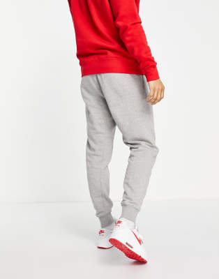 red hoodie and grey sweatpants