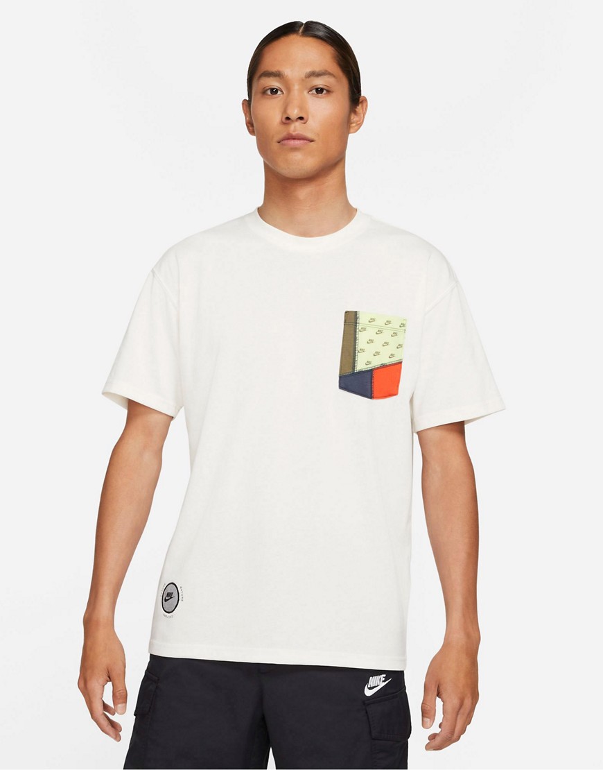 Nike Revival pocket T-shirt in off-white-Neutral