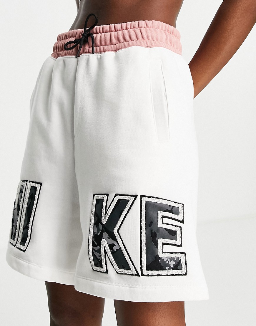 Nike Revival Statement high waist shorts in white