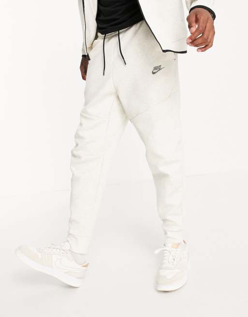 Nike Revival Tech Fleece joggers in cream ASOS