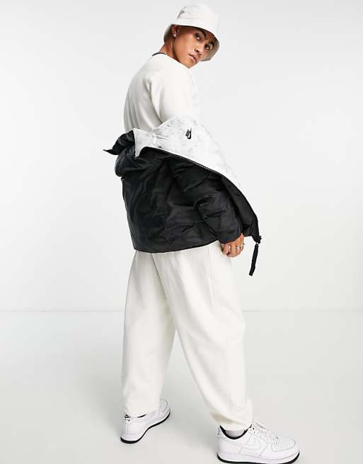 Nike Revival Therma-FIT reversible puffer jacket in black Nike Revival Therma-FIT reversible puffer jacket in black