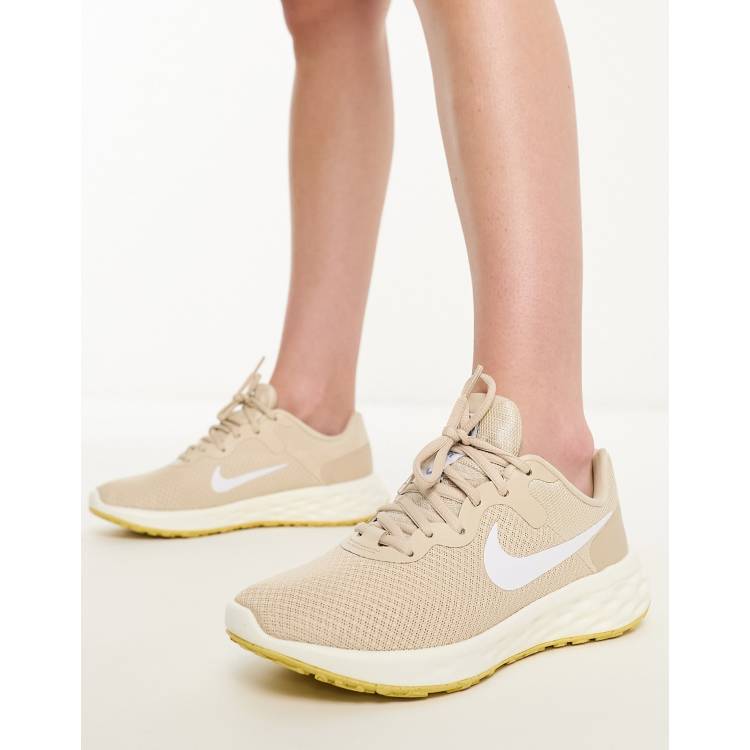 Nike Revolution 5 sneakers in stone ASOS