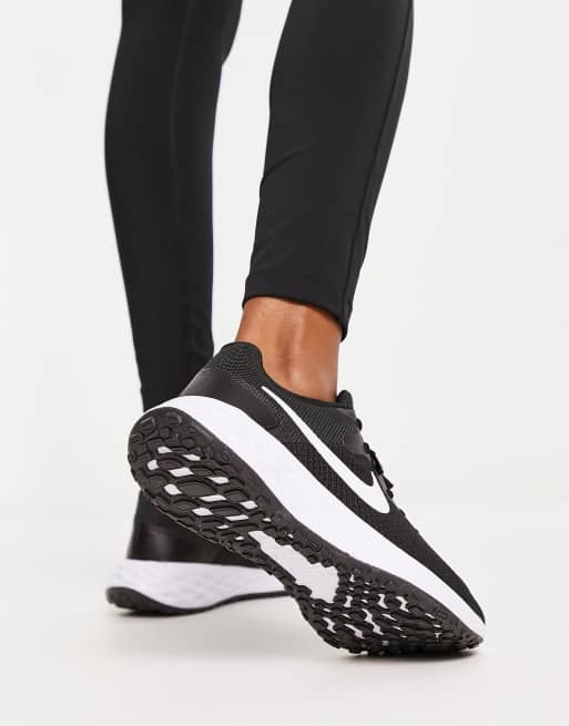 Nike Revolution Next sneakers in black and white | ASOS