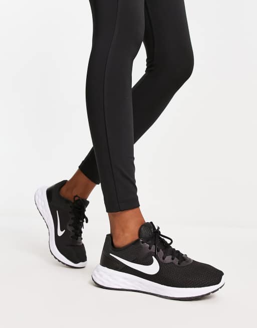 Nike Revolution Next sneakers in black and white | ASOS