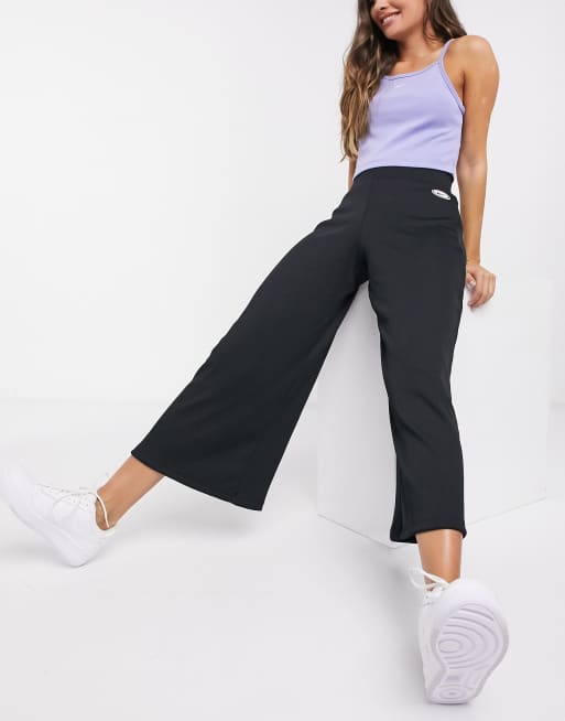 Nike ribbed high waist wide leg joggers in black, ASOS