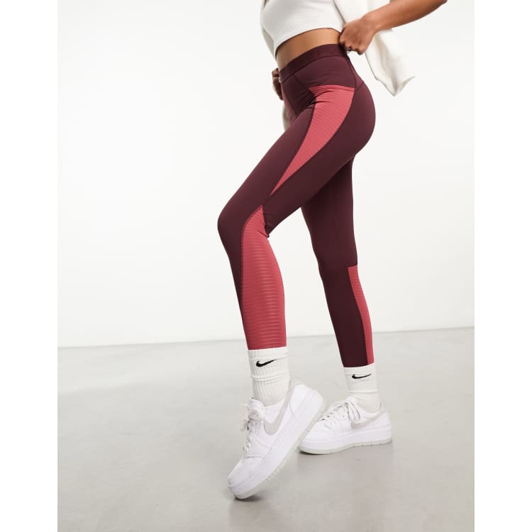 Nike Road To Wellness leggings in burgundy