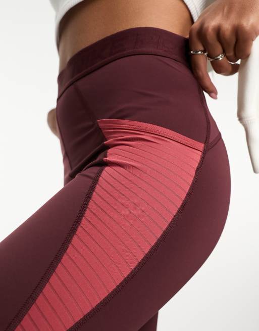 Nike Road To Wellness leggings in burgundy