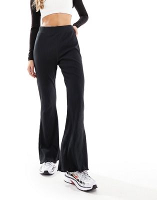 Nike Road To Wellness ribbed jersey wide leg pants in black | ASOS