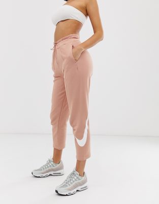 nike rose gold oversized swoosh joggers