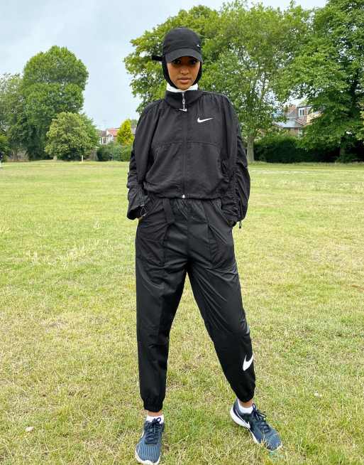 Nike ruched sleeve swoosh zip jacket in black new arrivals