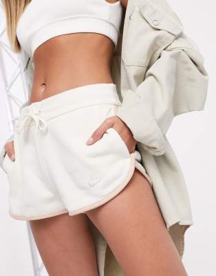 cream nike shorts