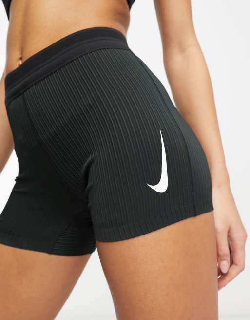 Nike legging shorts in black with mini swoosh, ASOS