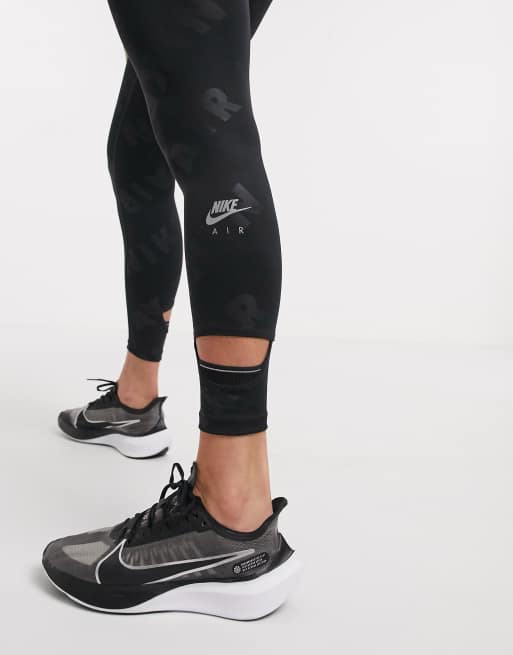 Nike all cheap over logo leggings