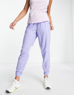 NIKE AIR DRI-FIT PANTS IN LILAC-PURPLE