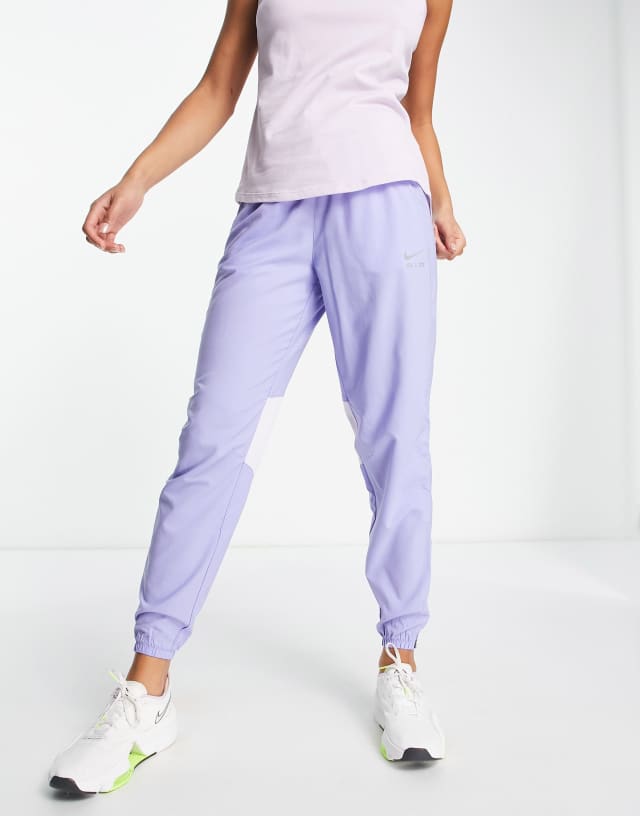 Nike Running Air Dri-FIT pants in lilac