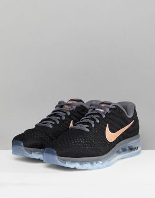 black nike trainers with rose gold tick