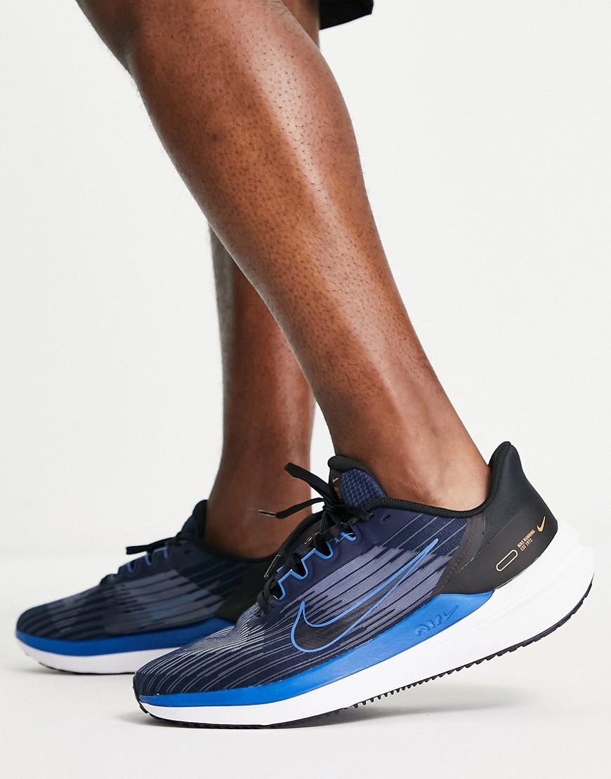 Nike Running Air Winflo 9 trainers in dark navy and blue
