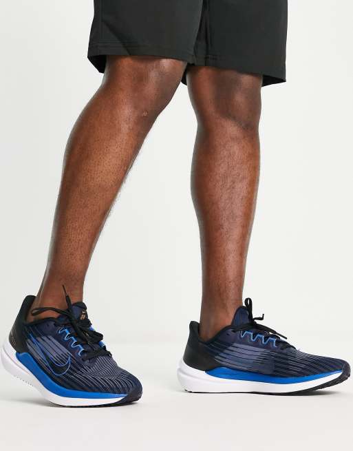 Nike Running Air Winflo 9 trainers in dark navy and blue