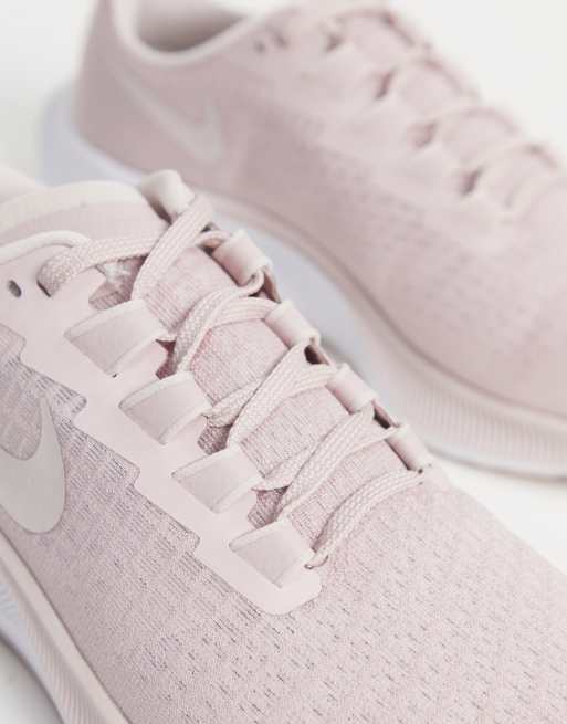 Blush pink hot sale nike trainers