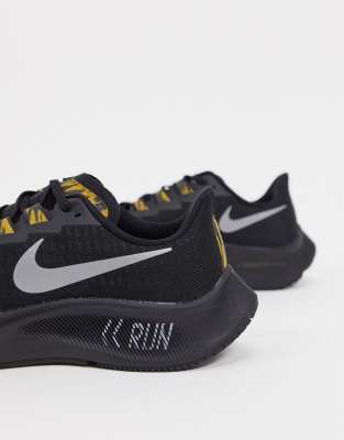 nike pegasus 37 black and gold