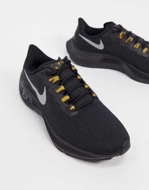 Nike pegasus sales gold black