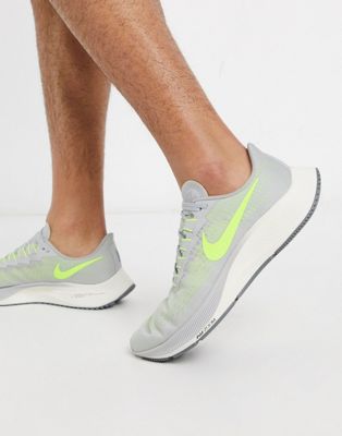 grey and green trainers