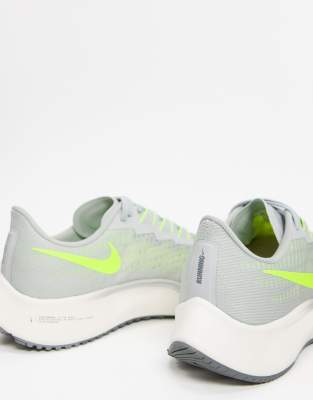 grey and green nike trainers