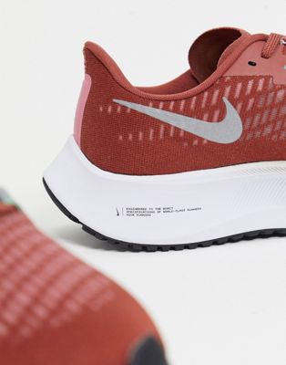 red nike running trainers