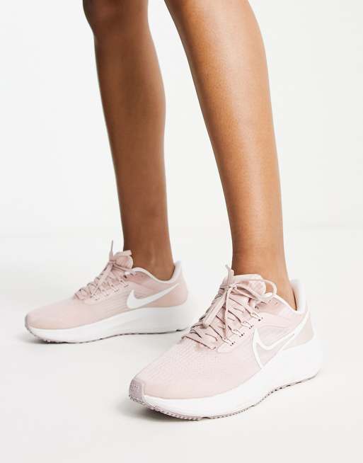 Pink running nike on sale shoes